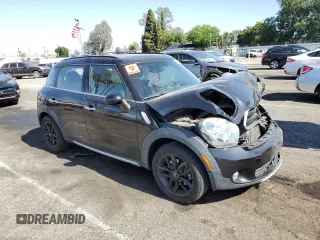 2016 MINI Countryman with VIN WMWZB3C58GWR47074, listed as a Copart auction lot 57174885 with 83,062 mi miles and Salvage title. Bid and sale history available at DreamBid. Image 4.