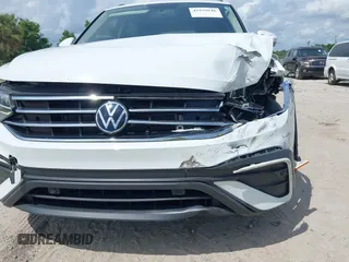 2022 Volkswagen Tiguan S z VIN 3VV1B7AX0NM126321, wystawiony jako IAAI lot #41939646 z przebiegiem 62 309 mil mil oraz . Historia ofert i sprzedaży dostępna na DreamBid. Obrazek 19.