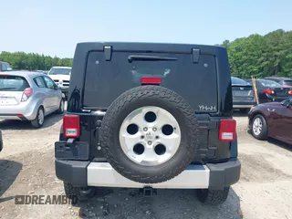 2014 Jeep Wrangler Unlimited Sahara with VIN 1C4BJWEG0EL273086, listed as a IAAI auction lot 42340938 with 121,448 mi miles and . Bid and sale history available at DreamBid. Image 16.