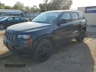 2018 Jeep Grand Cherokee Laredo E with VIN 1C4RJFAG3JC105232, listed as a Copart auction lot 75843694 with 93,279 mi miles and Salvage Title. Bid and sale history available at DreamBid. Image 1.