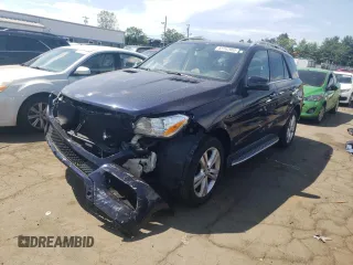 2015 Mercedes-Benz M 350 with VIN 4JGDA5HB6FA443981, listed as a Copart auction lot 61742665 with 110,991 mi miles and Salvage title. Bid and sale history available at DreamBid. Image 1.