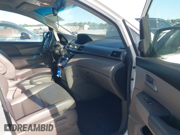 2012 Honda Odyssey Touring with VIN 5FNRL5H93CB125241, listed as a IAAI auction lot 42299053 with 125,549 mi miles and . Bid and sale history available at DreamBid. Image 5.