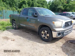 2007 Toyota Tundra SR5 z VIN 5TBRT54197S455329, wystawiony jako IAAI lot #42622477 z przebiegiem 378 925 mil mil oraz . Historia ofert i sprzedaży dostępna na DreamBid. Obrazek 1.