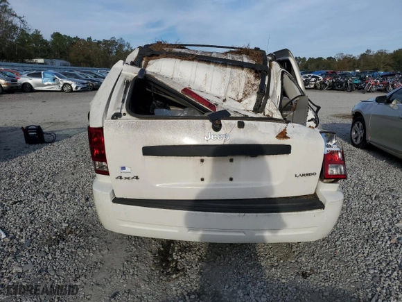 2005 Jeep Grand Cherokee Laredo with VIN 1J4HR48N35C541141, listed as a Copart auction lot 78196654 with 100,470 mi miles and Salvage Title. Bid and sale history available at carsss.com. Image 6.