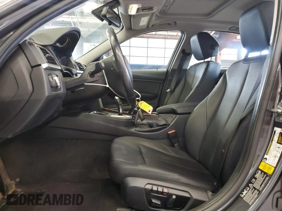 2014 BMW 3 Series 320i xDrive with VIN WBA3C3C53EF985375, listed as a Copart auction lot 62833435 with 75,726 mi miles and Salvage title. Bid and sale history available at DreamBid. Image 7.