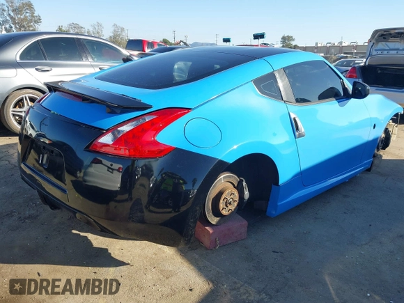 2012 Nissan 370Z Touring with VIN JN1AZ4EH5CM561472, listed as a IAAI auction lot 41640522 with 101,143 mi miles. Bid and sale history available at carsss.com. Image 4.