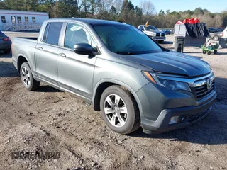 2017 Honda Ridgeline RTL z VIN 5FPYK2F56HB001735, wystawiony jako IAAI lot #41870216 z przebiegiem 200 149 mil mil oraz . Historia ofert i sprzedaży dostępna na DreamBid. Obrazek 1.