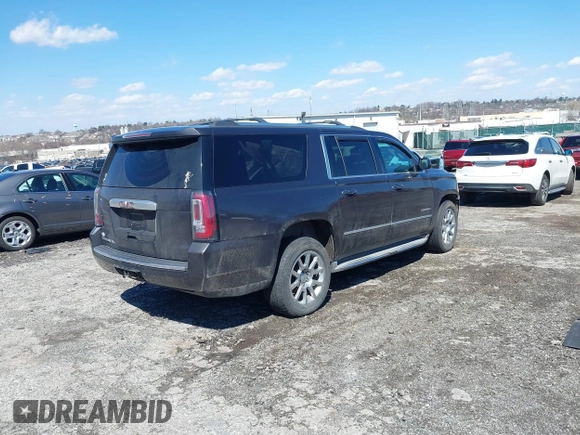 2015 GMC Yukon XL Denali with VIN 1GKS2JKJ5FR144991, listed as a IAAI auction lot 41877853 with 167,814 mi miles. Bid and sale history available at carsss.com. Image 4.