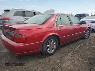 1999 Cadillac Seville Touring STS z VIN 1G6KY5496XU926352, wystawiony jako Copart lot #74711014 z przebiegiem 140 915 mil mil oraz Nie do naprawy • Non repairable. Historia ofert i sprzedaży dostępna na DreamBid. Obrazek 3.