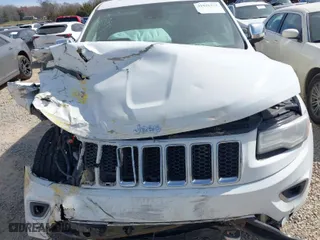 2014 Jeep Grand Cherokee Overland with VIN 1C4RJFCT6EC126897, listed as a IAAI auction lot 41826773 with 115,251 mi miles. Bid and sale history available at carsss.com. Image 6.