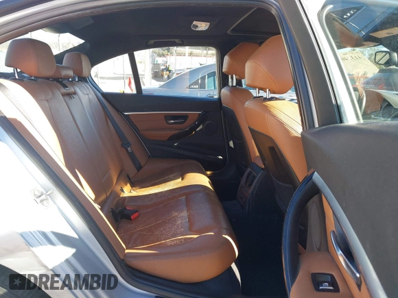 2016 BMW 3 Series with VIN WBA8F1C51GK438486, listed as a IAAI auction lot 41324078 with 80,321 mi miles and . Bid and sale history available at DreamBid. Image 8.