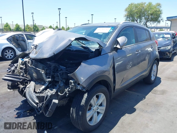 2012 Kia Sportage LX with VIN KNDPB3A2XC7273890, listed as a IAAI auction lot 39784243 with 146,067 mi miles. Bid and sale history available at carsss.com. Image 2.