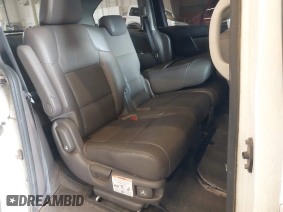 2014 Honda Odyssey EX-L with VIN 5FNRL5H60EB030841, listed as a IAAI auction lot 42271401 with 107,343 mi miles and . Bid and sale history available at DreamBid. Image 8.