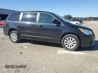 2014 Volkswagen Routan SE with VIN 2C4RVABG9ER135273, listed as a Copart auction lot 45343575 with 94,528 mi miles and Salvage title. Bid and sale history available at DreamBid. Image 4.