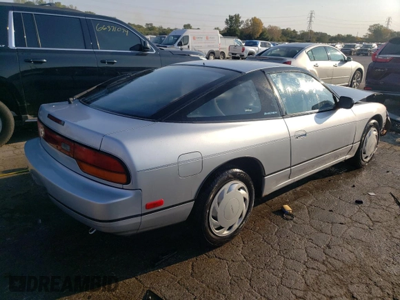 1990 Nissan 240SX z VIN JN1HS36P0LW121487, wystawiony jako Copart lot #70670904 z przebiegiem 123 794 mil mil oraz Szkody całkowita. Historia ofert i sprzedaży dostępna na DreamBid. Obrazek 3.