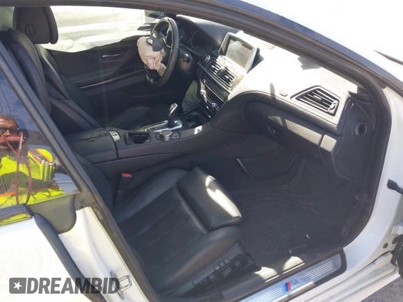 2015 BMW 6 Series 640i with VIN WBA6A0C54FGB53785, listed as a IAAI auction lot 40612020 with 67,524 mi miles and . Bid and sale history available at DreamBid. Image 5.