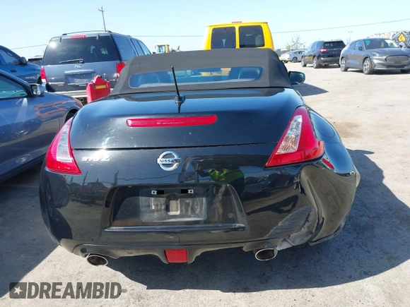 2014 Nissan 370Z Touring with VIN JN1AZ4FH8EM620208, listed as a IAAI auction lot 42094292 with 68,799 mi miles and . Bid and sale history available at DreamBid. Image 16.