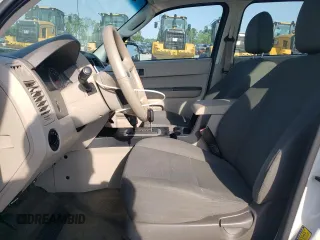 2010 Ford Escape XLS with VIN 1FMCU0C76AKB82752, listed as a Copart auction lot 57626565 with 194,931 mi miles and Salvage title. Bid and sale history available at DreamBid. Image 7.