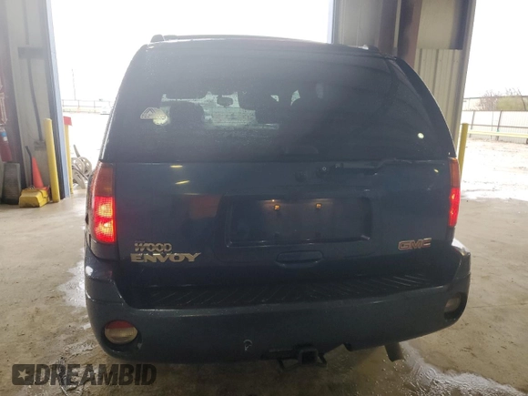 2005 GMC Envoy SLT with VIN 1GKDS13S352104934, listed as a Copart auction lot 86205864 with 166,638 mi miles and Clean Title. Bid and sale history available at carsss.com. Image 6.