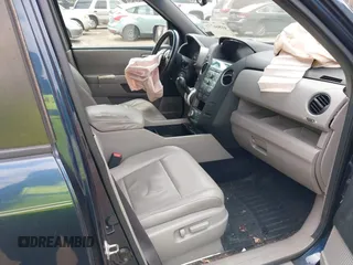 2010 Honda Pilot Touring with VIN 5FNYF4H80AB025356, listed as a IAAI auction lot 42029008 with 138,785 mi miles. Bid and sale history available at carsss.com. Image 5.