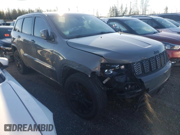 2022 Jeep Grand Cherokee WK Altitude with VIN 1C4RJFAG9NC140332, listed as a Copart auction lot 83763484 with 56,886 mi miles and Salvage Title. Bid and sale history available at carsss.com. Image 4.