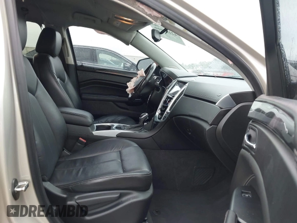 2015 Cadillac SRX z VIN 3GYFNAE37FS597695, wystawiony jako IAAI lot #42184666 z przebiegiem 106 210 mil mil oraz . Historia ofert i sprzedaży dostępna na DreamBid. Obrazek 5.
