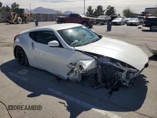 2014 Nissan 370Z Nismo with VIN JN1AZ4EH2EM633022, listed as a Copart auction lot 46947575 with 115,042 mi miles and Salvage Title. Bid and sale history available at DreamBid. Image 4.