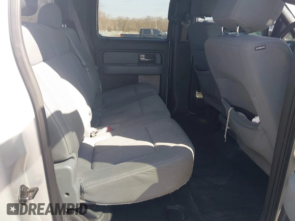 2014 Ford F-150 with VIN 1FTVW1EFXEKD65059, listed as a IAAI auction lot 41791605 with 146,190 mi miles and . Bid and sale history available at DreamBid. Image 8.