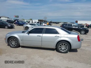 2005 Chrysler 300 with VIN 2C3JA63H05H693522, listed as a IAAI auction lot 41847279 with 162,037 mi miles. Bid and sale history available at carsss.com. Image 14.