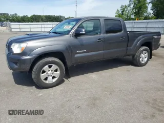 2015 Toyota Tacoma PreRunner with VIN 3TMKU4HN4FM046232, listed as a Copart auction lot 55879565 with 127,377 mi miles and Salvage title. Bid and sale history available at DreamBid. Image 1.