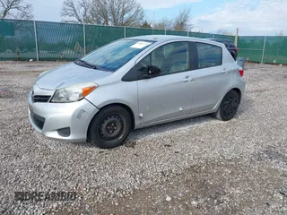 2013 Toyota Yaris L with VIN JTDKTUD32DD559222, listed as a IAAI auction lot 41883929 with 156,479 mi miles. Bid and sale history available at carsss.com. Image 2.