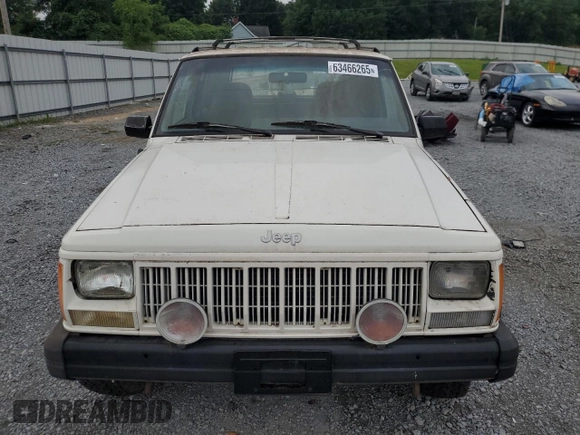 1996 Jeep Cherokee Sport z VIN 1J4FJ68S3TL103684, wystawiony jako Copart lot #63466265 z przebiegiem 163 715 mil mil oraz Czysty tytuł • Clean title. Historia ofert i sprzedaży dostępna na DreamBid. Obrazek 5.
