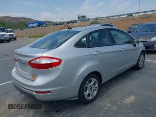 2016 Ford Fiesta SE with VIN 3FADP4BJ6GM122174, listed as a IAAI auction lot 42161294 with 138,090 mi miles. Bid and sale history available at carsss.com. Image 4.