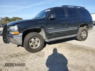2001 Chevrolet Tahoe LT with VIN 1GNEC13T31R145370, listed as a Copart auction lot 88286985 with 258,894 mi miles and Salvage Title. Bid and sale history available at carsss.com. Image 1.