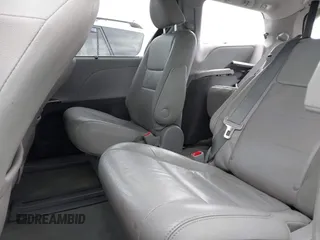 2016 Toyota Sienna XLE with VIN 5TDYK3DC8GS718289, listed as a IAAI auction lot 41774375 with 154,067 mi miles. Bid and sale history available at carsss.com. Image 8.