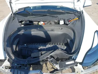 2023 Tesla Model 3 with VIN 5YJ3E1EA9PF557880, listed as a IAAI auction lot 42481413 with 40,582 mi miles and . Bid and sale history available at DreamBid. Image 10.