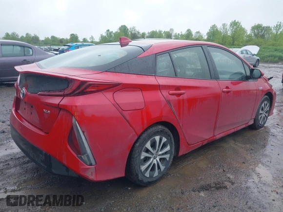 2021 Toyota Prius LE with VIN JTDKAMFP7M3178008, listed as a IAAI auction lot 42273697 with 110,605 mi miles and . Bid and sale history available at DreamBid. Image 4.