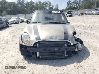 2011 MINI Convertible with VIN WMWZN3C54BT133246, listed as a Copart auction lot 69780074 with 176,955 mi miles and Salvage title. Bid and sale history available at DreamBid. Image 5.