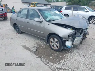 2004 Nissan Sentra S z VIN 3N1CB51D84L857054, wystawiony jako IAAI lot #42403455 z przebiegiem 95 884 mil mil oraz . Historia ofert i sprzedaży dostępna na DreamBid. Obrazek 1.