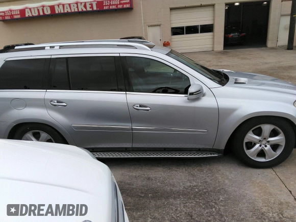 2012 Mercedes-Benz GL-Class GL 450 with VIN 4JGBF7BE1CA777189, listed as a IAAI auction lot 42201396 with 213,114 mi miles. Bid and sale history available at carsss.com. Image 13.