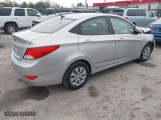2015 Hyundai Accent GLS with VIN KMHCT4AE7FU849786, listed as a IAAI auction lot 41965237 with 98,587 mi miles. Bid and sale history available at carsss.com. Image 4.