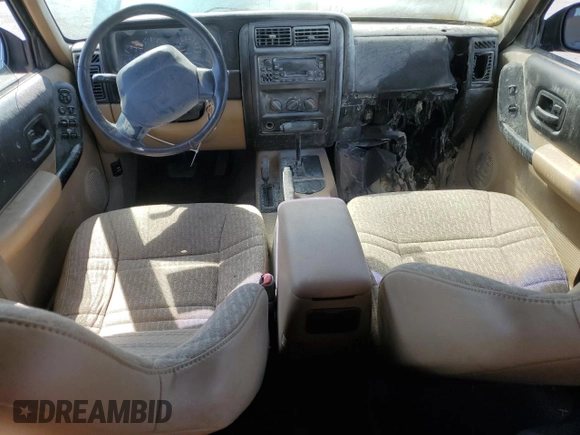 2001 Jeep Cherokee Sport with VIN 1J4FF48S91L610463, listed as a Copart auction lot 59601495 with Not provided miles and Salvage title. Bid and sale history available at DreamBid. Image 8.