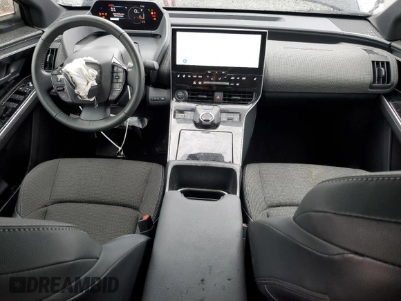 2024 Toyota bZ4X XLE with VIN JTMABACA3RA079406, listed as a Copart auction lot 56758445 with 3,483 mi miles and Salvage title. Bid and sale history available at DreamBid. Image 8.