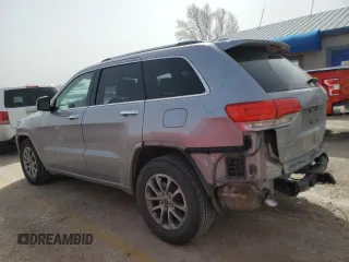 2014 Jeep Grand Cherokee Overland with VIN 1C4RJFCG4EC326325, listed as a Copart auction lot 49166645 with 128,261 mi miles and Salvage Title. Bid and sale history available at DreamBid. Image 2.