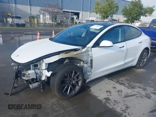 2021 Tesla Model 3 Long Range with VIN 5YJ3E1EB9MF055990, listed as a IAAI auction lot 41584065 with 49,147 mi miles and . Bid and sale history available at carsss.com. Image 18.