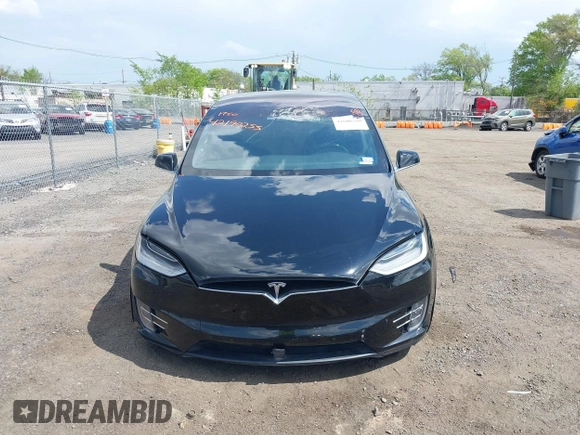 2019 Tesla Model X 75D with VIN 5YJXCBE21KF180203, listed as a IAAI auction lot 42190255 with 114,294 mi miles and . Bid and sale history available at DreamBid. Image 12.