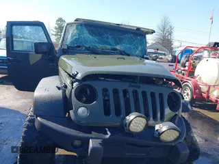 2015 Jeep Wrangler Unlimited Rubicon with VIN 1C4BJWFG0FL623431, listed as a IAAI auction lot 41651317 with 105,508 mi miles. Bid and sale history available at carsss.com. Image 12.
