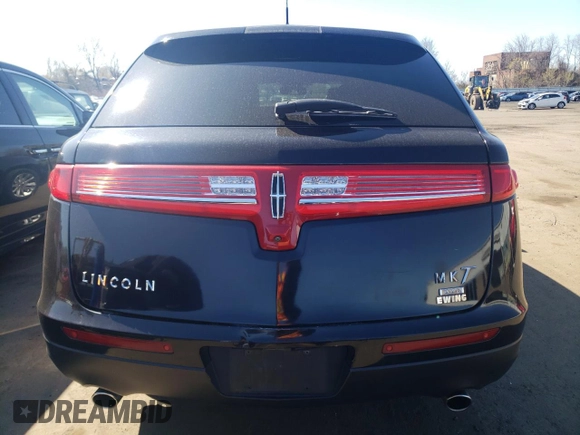 2019 Lincoln MKT with VIN 2LMHJ5NK0KBL02980, listed as a Copart auction lot 53423215 with 191,835 mi miles and Salvage Title. Bid and sale history available at DreamBid. Image 6.