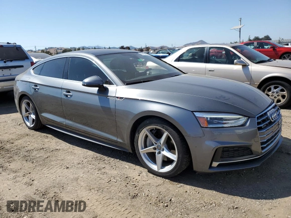 2018 Audi A5 Sportback Premium with VIN WAUDNCF51JA130255, listed as a Copart auction lot 69116454 with 58,292 mi miles and Salvage Title. Bid and sale history available at carsss.com. Image 4.