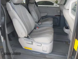 2014 Toyota Sienna Limited z VIN 5TDDK3DC9ES088584, wystawiony jako IAAI lot #42333016 z przebiegiem 115 138 mil mil oraz . Historia ofert i sprzedaży dostępna na DreamBid. Obrazek 8.